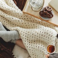 A triangular variation on the traditional granny square, quick to work in any yarn and usable in afghans, vests and bags.