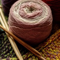 What to know before starting a crocheted blanket -- the stitches required, planning the size, and buying yarn.
