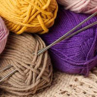 A textured crocheted baby blanket using roughly 1500 yards of yarn, easily widened by keeping the stitch multiple.