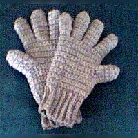 Free crocheted gloves pattern in 4 ply yarn with a 4.50 mm hook: a ribbed cuff, a full hand and each finger worked in turn. Designed so one glove fits either hand.