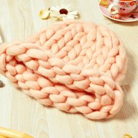 Making crocheted flowers for embellishment -- how the shapes are built, choosing yarn, and what to do with the finished blooms.