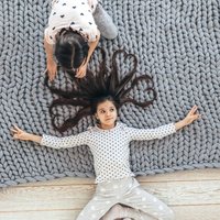 A seamless knitted baby hoodie in worsted weight yarn on US 5 (3.75mm) and US 6 (4.0mm) needles, sized 6, 12, 18 months and 2 years.